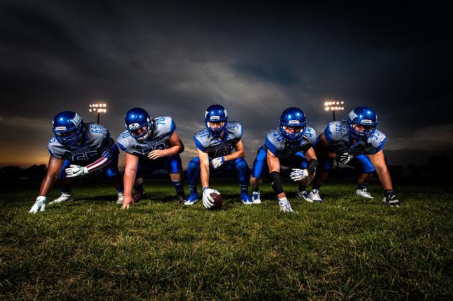 Five football players 