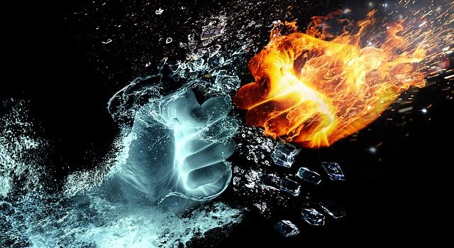 A cold, water hand and a red, fire hand colliding