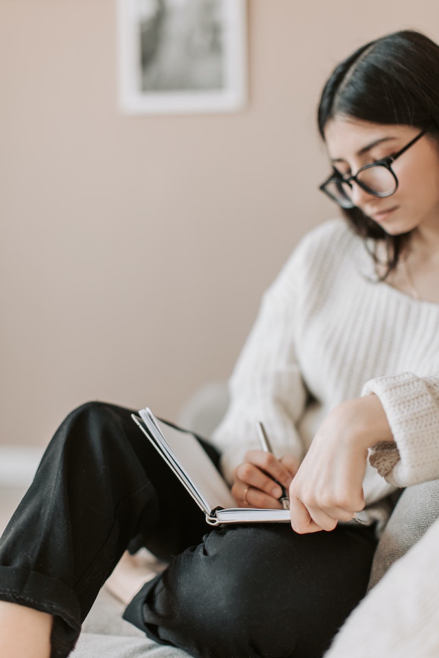 A girl writing in her journal